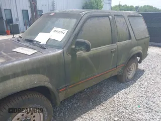 1991 Ford Explorer z VIN 1FMCU24X3MUA54214, wystawiony jako IAAI lot #42010794 z przebiegiem 55 239 mil mil oraz . Historia ofert i sprzedaży dostępna na DreamBid. Obrazek 6.