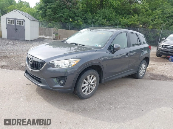 2014 Mazda CX-5 Touring z VIN JM3KE4CY2E0348500, wystawiony jako IAAI lot #42318155 z przebiegiem 182 616 mil mil oraz . Historia ofert i sprzedaży dostępna na DreamBid. Obrazek 17.
