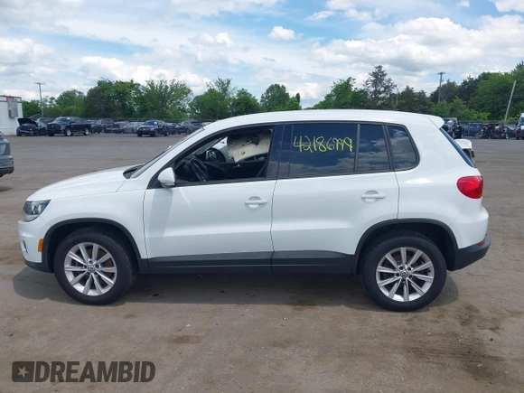 2014 Volkswagen Tiguan S with VIN WVGBV3AX0EW589381, listed as a IAAI auction lot 42186999 with 144,137 mi miles and . Bid and sale history available at DreamBid. Image 14.