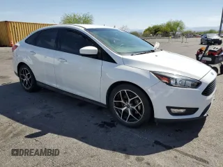 2018 Ford Focus SE with VIN 1FADP3FE4JL322857, listed as a Copart auction lot 58090025 with 58,148 mi miles and Clean title. Bid and sale history available at DreamBid. Image 4.