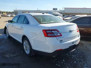 2018 Ford Taurus SE with VIN 1FAHP2D85JG127853, listed as a IAAI auction lot 41596548 with 128,087 mi miles. Bid and sale history available at carsss.com. Image 3.