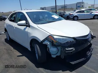2018 Toyota Corolla L with VIN 5YFBURHE0JP798184, listed as a IAAI auction lot 42525314 with 147,029 mi miles and . Bid and sale history available at DreamBid. Image 1.