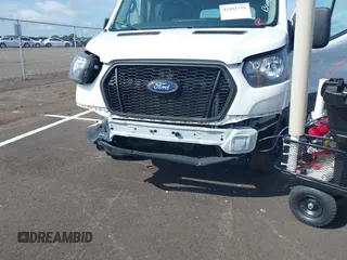 2022 Ford Transit Cargo with VIN 1FTBR1C83NKA81478, listed as a IAAI auction lot 42491735 with 12,902 mi miles and . Bid and sale history available at DreamBid. Image 6.