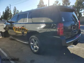2017 Chevrolet Suburban Premier with VIN 1GNSCJKC3HR126011, listed as a Copart auction lot 87095354 with 122,437 mi miles and Clean Title. Bid and sale history available at carsss.com. Image 2.