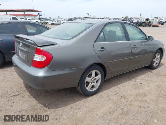 2003 Toyota Camry LE with VIN JTDBE32K530236769, listed as a IAAI auction lot 42250783 with 194,445 mi miles and . Bid and sale history available at DreamBid. Image 4.