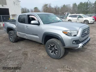2019 Toyota Tacoma 4WD SR with VIN 5TFCZ5AN8KX168893, listed as a IAAI auction lot 41823745 with 146,557 mi miles. Bid and sale history available at carsss.com. Image 1.