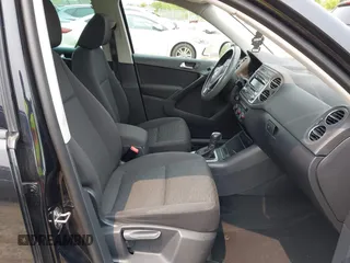 2013 Volkswagen Tiguan S with VIN WVGAV3AX2DW594334, listed as a IAAI auction lot 42405989 with 96,559 mi miles and . Bid and sale history available at DreamBid. Image 5.