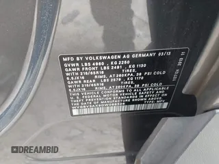 2013 Volkswagen Tiguan SE z VIN WVGBV3AX9DW088326, wystawiony jako IAAI lot #42320279 z przebiegiem 126 840 mil mil oraz . Historia ofert i sprzedaży dostępna na DreamBid. Obrazek 9.
