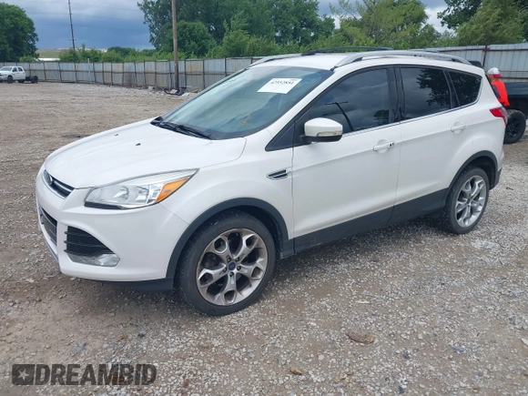 2016 Ford Escape Titanium z VIN 1FMCU9J90GUC76504, wystawiony jako IAAI lot #42552851 z przebiegiem 89 570 mil mil oraz . Historia ofert i sprzedaży dostępna na DreamBid. Obrazek 2.