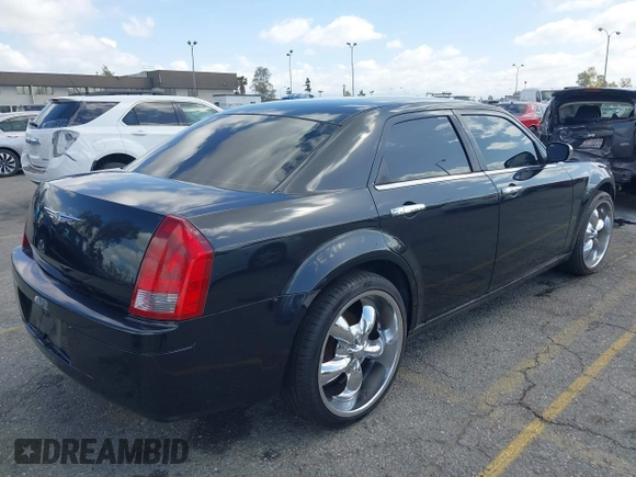 2007 Chrysler 300 with VIN 2C3KA43R57H852331, listed as a IAAI auction lot 41946742 with 211,168 mi miles. Bid and sale history available at carsss.com. Image 4.