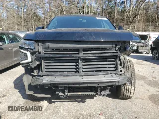 2023 Chevrolet Suburban LS with VIN 1GNSCBKD8PR163178, listed as a Copart auction lot 47844175 with 104,369 mi miles and Salvage Title. Bid and sale history available at DreamBid. Image 5.