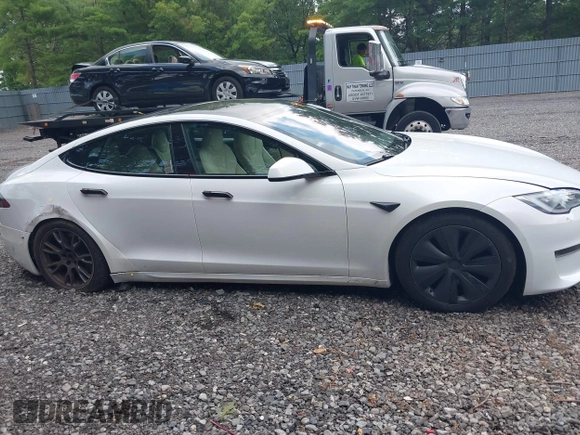 2021 Tesla Model S Plaid z VIN 5YJSA1E62MF452838, wystawiony jako IAAI lot #42726183 z przebiegiem 21 725 mil mil oraz . Historia ofert i sprzedaży dostępna na DreamBid. Obrazek 13.