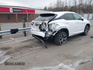 2017 Lexus RX with VIN 2T2BGMCA1HC018939, listed as a IAAI auction lot 41788675 with 104,305 mi miles. Bid and sale history available at carsss.com. Image 4.