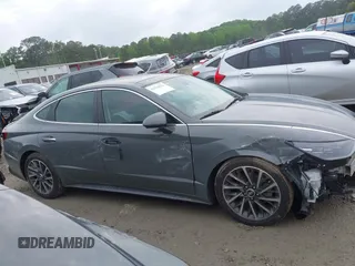 2022 Hyundai Sonata Limited z VIN KMHL34J23NA203604, wystawiony jako IAAI lot #42120512 z przebiegiem 55 529 mil mil oraz . Historia ofert i sprzedaży dostępna na DreamBid. Obrazek 13.
