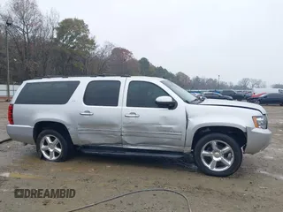 2014 Chevrolet Suburban LTZ with VIN 1GNSCKE05ER173446, listed as a IAAI auction lot 41047096 with 189,049 mi miles and . Bid and sale history available at DreamBid. Image 14.