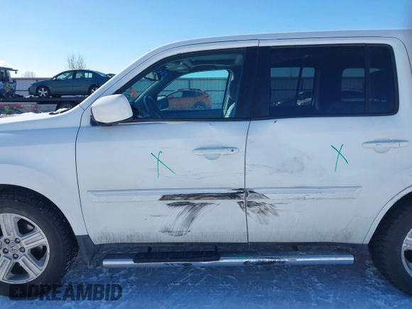 2013 Honda Pilot EX-L with VIN 5FNYF4H79DB086426, listed as a IAAI auction lot 41572456 with 190,745 mi miles and . Bid and sale history available at DreamBid. Image 14.