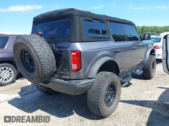 2022 Ford Bronco with VIN 1FMDE5BH9NLB87372, listed as a IAAI auction lot 42178135 with 71,585 mi miles and . Bid and sale history available at DreamBid. Image 4.