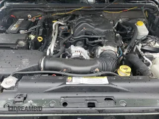 2012 Jeep Wrangler Unlimited Sport with VIN 1C4HJWDG8CL122067, listed as a Copart auction lot 58549805 with 124,658 mi miles and Clean title. Bid and sale history available at DreamBid. Image 12.