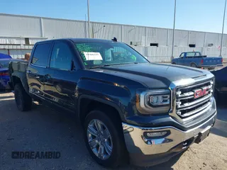2018 GMC Sierra 1500 SLT with VIN 3GTP1NEC3JG527054, listed as a IAAI auction lot 41966165 with 81,806 mi miles and . Bid and sale history available at DreamBid. Image 1.