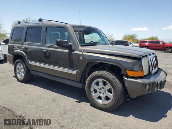 2006 Jeep Commander Limited with VIN 1J8HG58296C170911, listed as a Copart auction lot 59883355 with 112,860 mi miles and Salvage title. Bid and sale history available at DreamBid. Image 4.