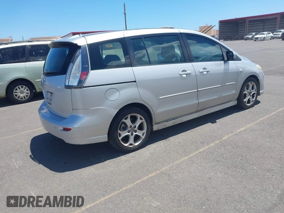 2009 Mazda 5 Sport with VIN JM1CR293990334438, listed as a IAAI auction lot 42561953 with 118,178 mi miles and . Bid and sale history available at DreamBid. Image 4.