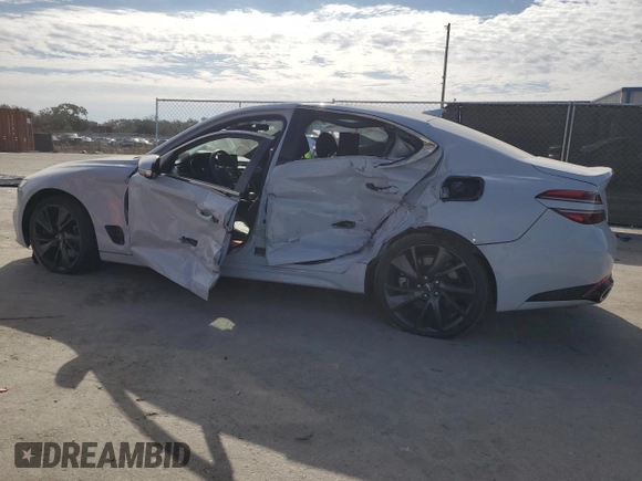 2022 Genesis G70 3.3T with VIN KMTG54TE5NU084574, listed as a Copart auction lot 87732465 with Not Provided miles and Salvage Title. Bid and sale history available at DreamBid. Image 2.