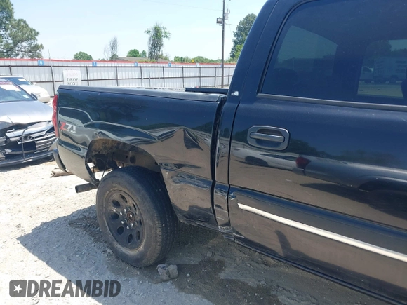 2005 Chevrolet Silverado 1500 LT with VIN 2GCEK13T551277184, listed as a IAAI auction lot 42028710 with Not Provided miles and . Bid and sale history available at DreamBid. Image 6.