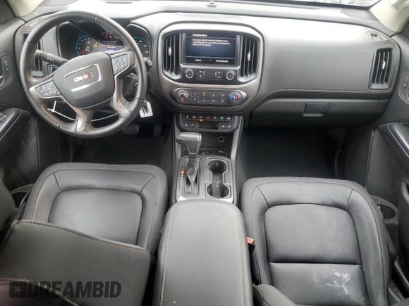 2021 GMC Canyon 4WD AT4 z VIN 1GTG6FEN9M1192443, wystawiony jako Copart lot #54955745 z przebiegiem 1544 mil mil oraz Tytuł czysty. Historia ofert i sprzedaży dostępna na DreamBid. Obrazek 8.