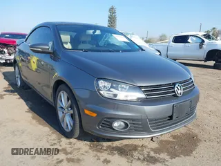 2015 Volkswagen Eos Komfort with VIN WVWBW8AH7FV004228, listed as a IAAI auction lot 41659825 with 71,468 mi miles and . Bid and sale history available at DreamBid. Image 1.