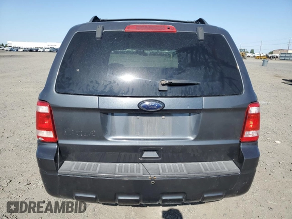 2008 Ford Escape XLS с VIN 1FMCU02Z08KB06103, выставлен на аукционе Copart как лот 60934415 с пробегом Не указан миль и Списание • Salvage title. История ставок и продаж доступна на DreamBid. Изображение 6.