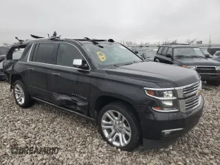 2020 Chevrolet Suburban Premier z VIN 1GNSKJKJ0LR287376, wystawiony jako Copart lot #83407244 z przebiegiem Nie podano mil oraz Szkoda całkowita • Salvage title. Historia ofert i sprzedaży dostępna na DreamBid. Obrazek 4.
