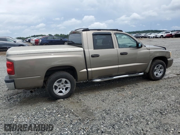 2006 Dodge Dakota SLT with VIN 1D7HE48N66S641149, listed as a Copart auction lot 58823615 with 169,002 mi miles and Salvage title. Bid and sale history available at DreamBid. Image 3.