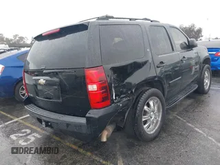 2008 Chevrolet Tahoe LTZ with VIN 1GNFC13J48R160246, listed as a IAAI auction lot 41808982 with 166,516 mi miles and . Bid and sale history available at DreamBid. Image 4.
