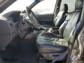 2001 Jeep Grand Cherokee Laredo with VIN 1J4GW48N01C682814, listed as a Copart auction lot 76239634 with 0 mi miles and Salvage Title. Bid and sale history available at carsss.com. Image 7.