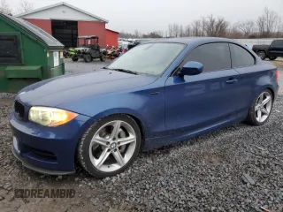 2013 BMW 1 Series 135i with VIN WBAUC9C57DVY60214, listed as a Copart auction lot 76045144 with 59,276 mi miles and Salvage Title. Bid and sale history available at carsss.com. Image 1.