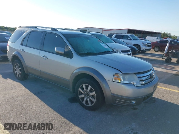 2008 Ford Taurus X SEL z VIN 1FMDK02W48GA11501, wystawiony jako IAAI lot #42184768 z przebiegiem 247 428 mil mil oraz . Historia ofert i sprzedaży dostępna na DreamBid. Obrazek 1.