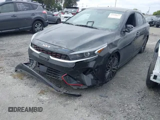 2023 Kia Forte GT-Line z VIN 3KPF54AD8PE539617, wystawiony jako IAAI lot #41890617 z przebiegiem 26 855 mil mil oraz . Historia ofert i sprzedaży dostępna na DreamBid. Obrazek 18.
