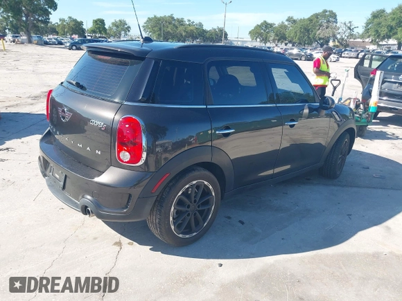 2015 MINI Countryman S with VIN WMWZC3C58FWT04316, listed as a IAAI auction lot 42525698 with 97,046 mi miles and . Bid and sale history available at DreamBid. Image 4.