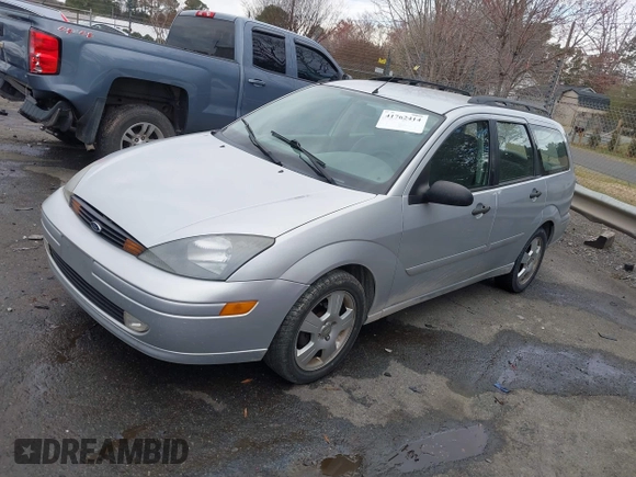 2004 Ford Focus ZTW z VIN 1FAFP35Z44W111027, wystawiony jako IAAI lot #41762414 z przebiegiem 155 535 mil mil oraz . Historia ofert i sprzedaży dostępna na DreamBid. Obrazek 2.