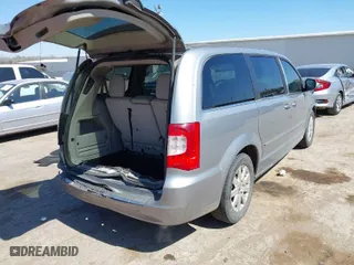 2013 Chrysler Town & Country Touring with VIN 2C4RC1BG8DR759800, listed as a IAAI auction lot 41841197 with 57,812 mi miles. Bid and sale history available at carsss.com. Image 4.