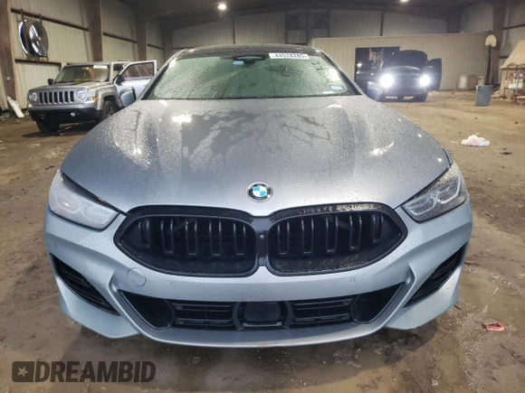 2023 BMW 8 Series 840i with VIN WBAGV2C06PCM19659, listed as a Copart auction lot 44528285 with 0 mi miles and Salvage Title. Bid and sale history available at carsss.com. Image 5.