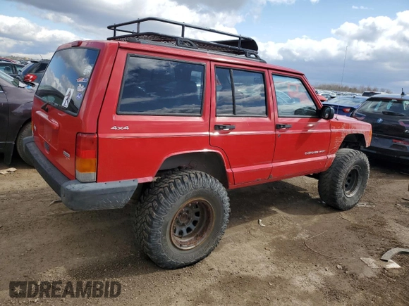 2000 Jeep Cherokee with VIN 1J4FF48S0YL113246, listed as a Copart auction lot 51861455 with 180,965 mi miles and Clean title. Bid and sale history available at DreamBid. Image 3.