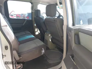 2004 Nissan Titan LE z VIN 1N6AA07BX4N537229, wystawiony jako IAAI lot #41234790 z przebiegiem 210 475 mil mil oraz . Historia ofert i sprzedaży dostępna na DreamBid. Obrazek 8.