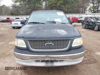 1999 Ford F-150 with VIN 1FTRX07W3XKC24438, listed as a IAAI auction lot 41634802 with Not provided miles and . Bid and sale history available at DreamBid. Image 6.