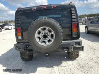 2003 Hummer H2 with VIN 5GRGN23U33H102570, listed as a Copart auction lot 77259654 with 0 mi miles and Salvage Title. Bid and sale history available at carsss.com. Image 6.