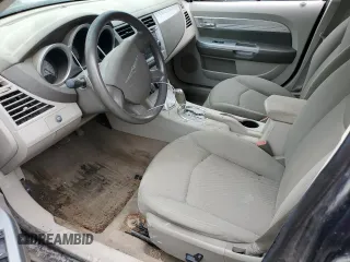 2007 Chrysler Sebring Touring z VIN 1C3LC56K57N527947, wystawiony jako Copart lot #52789485 z przebiegiem Nie podano mil oraz Szkody całkowita. Historia ofert i sprzedaży dostępna na DreamBid. Obrazek 7.