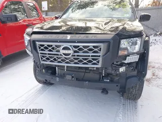 2022 Nissan Frontier S with VIN 1N6ED1CMXNN647043, listed as a IAAI auction lot 41410487 with 20,463 mi miles and . Bid and sale history available at DreamBid. Image 6.