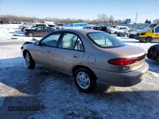 1997 Ford Escort LX z VIN 1FALP13P8VW240818, wystawiony jako Copart lot #88365875 z przebiegiem 43 416 mil mil oraz Szkoda całkowita • Salvage title. Historia ofert i sprzedaży dostępna na DreamBid. Obrazek 2.