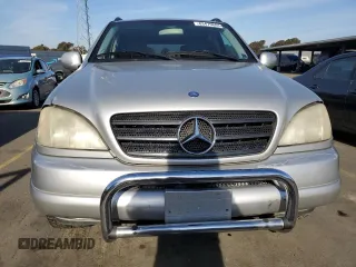 2000 Mercedes-Benz M-Class with VIN 4JGAB72E2YA185234, listed as a Copart auction lot 83479684 with 209,491 mi miles and Clean Title. Bid and sale history available at carsss.com. Image 5.