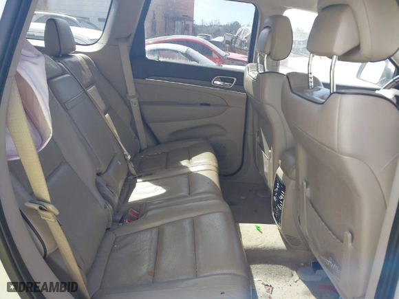 2014 Jeep Grand Cherokee Overland with VIN 1C4RJFCT6EC126897, listed as a IAAI auction lot 41826773 with 115,251 mi miles. Bid and sale history available at carsss.com. Image 8.